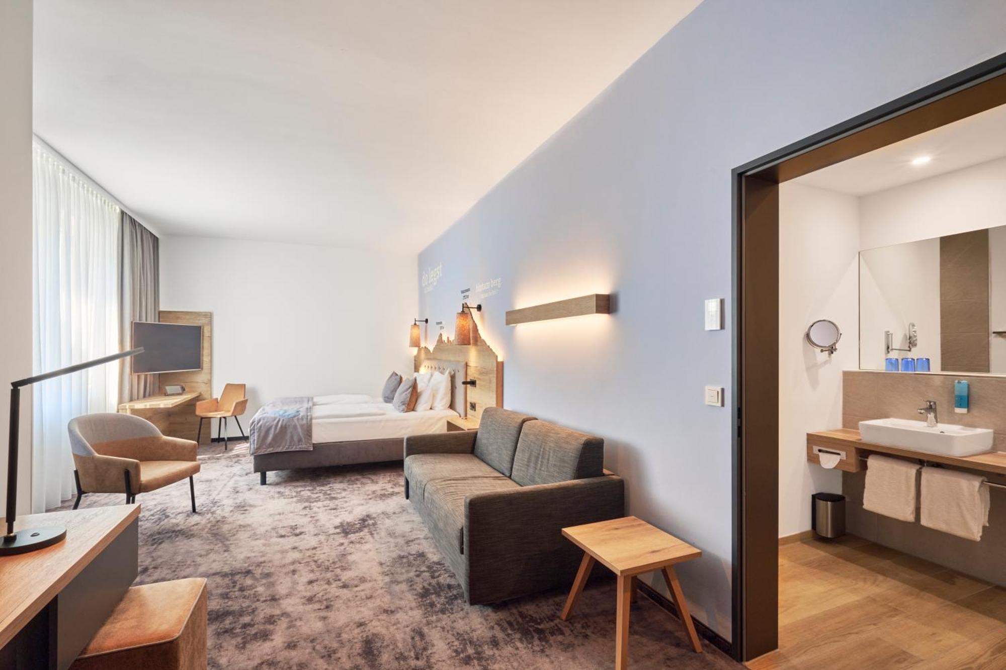 Junior Suite with Walk-In Shower and Sofa Bed