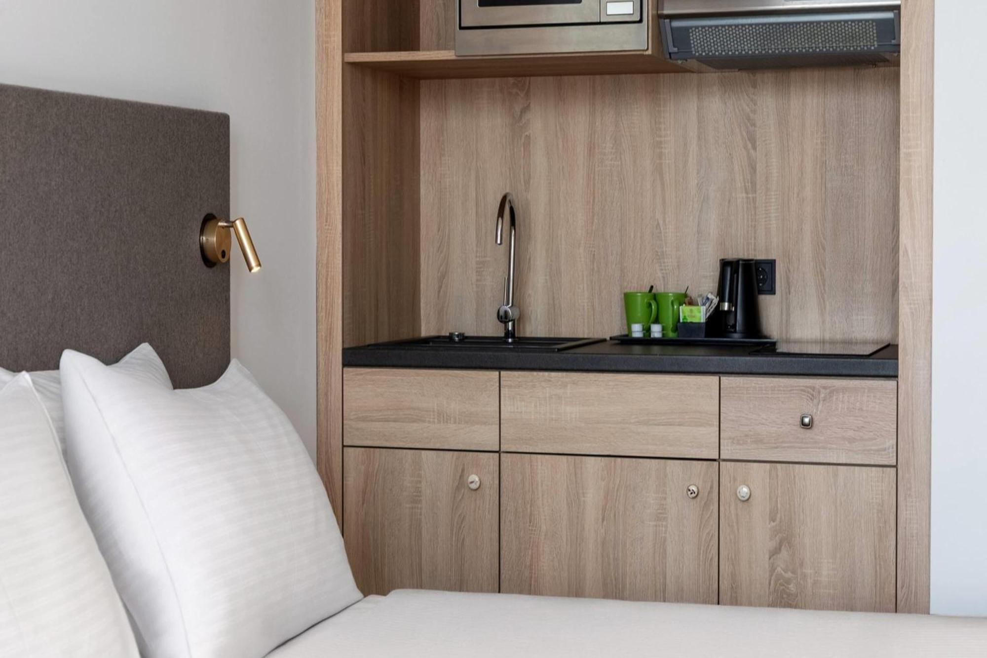 Chambre Lits Jumeaux Supérieure avec Kitchenette et Balcon - Non-Fumeurs