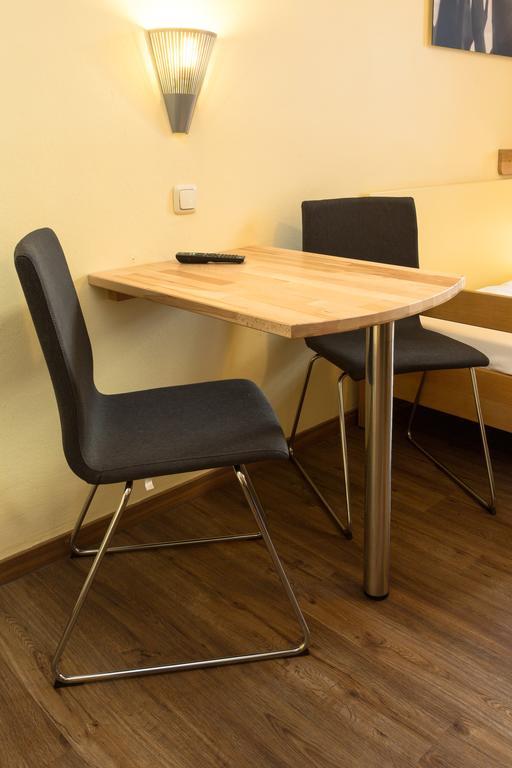 Quarto Individual com Banheiro Compartilhado